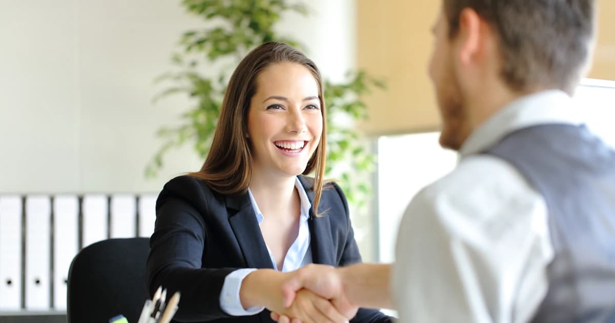 A real estate investor and private lender shaking hands after agreeing to fast, flexible financing terms