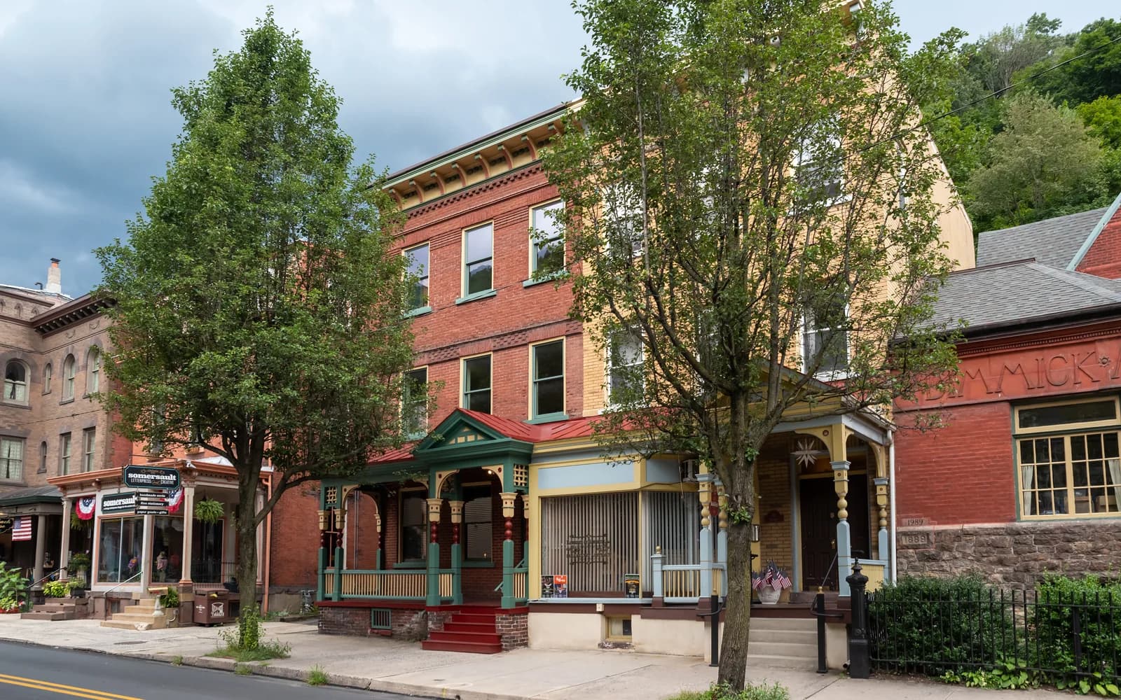 Historic brick storefronts and rowhomes on a Lehigh Valley main street representing local real estate investment opportunities